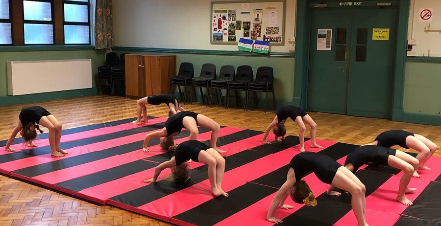 Elevate pupils practising gymnastic dance skills